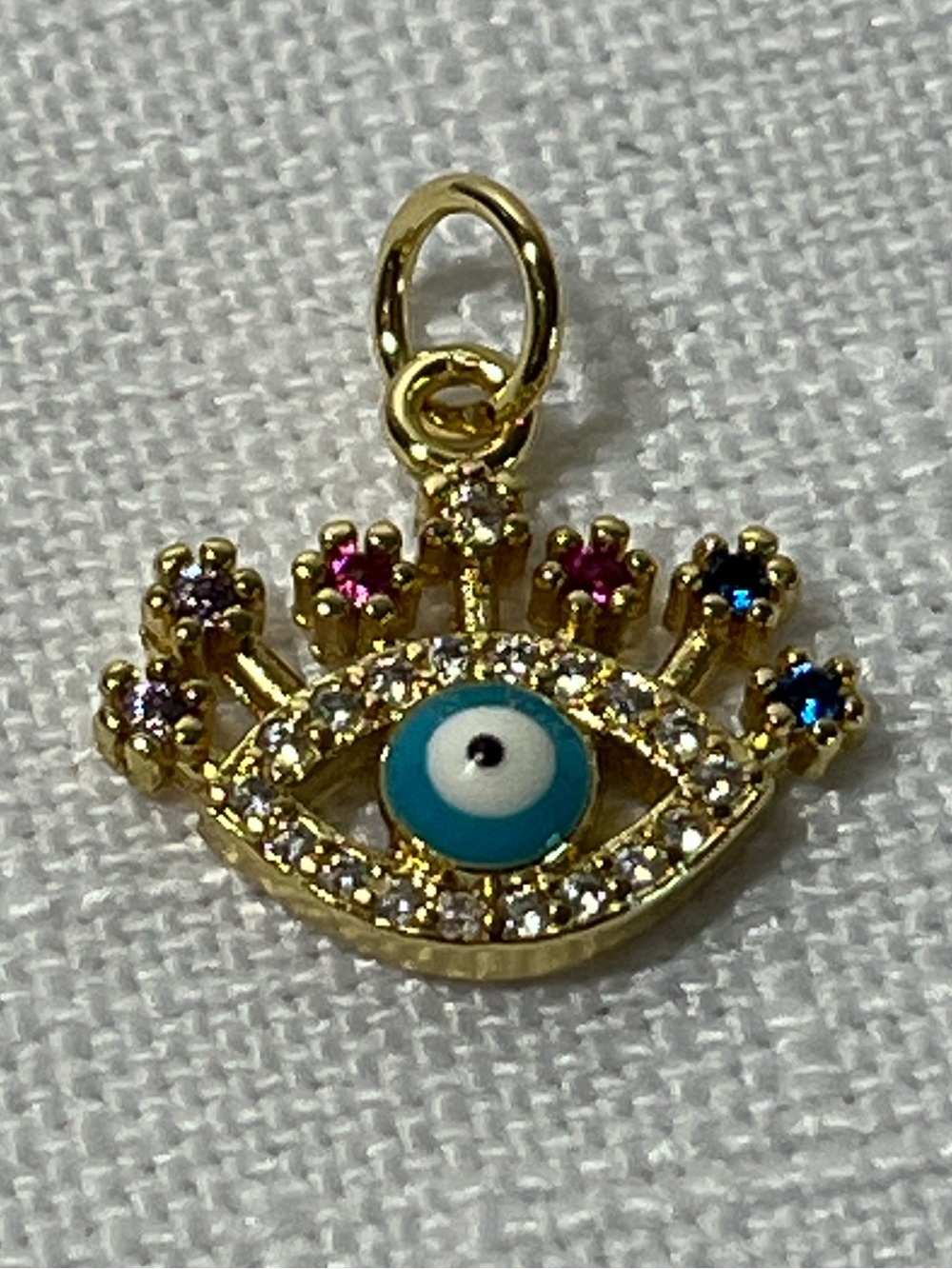 Evil Eye Charm Pendant with Blue Center
New
Gold tone